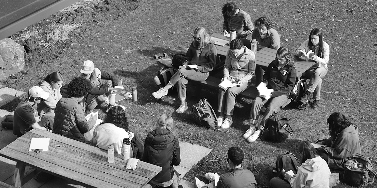 A class meets outside of Bowdoin's Roux Center for the Environment.