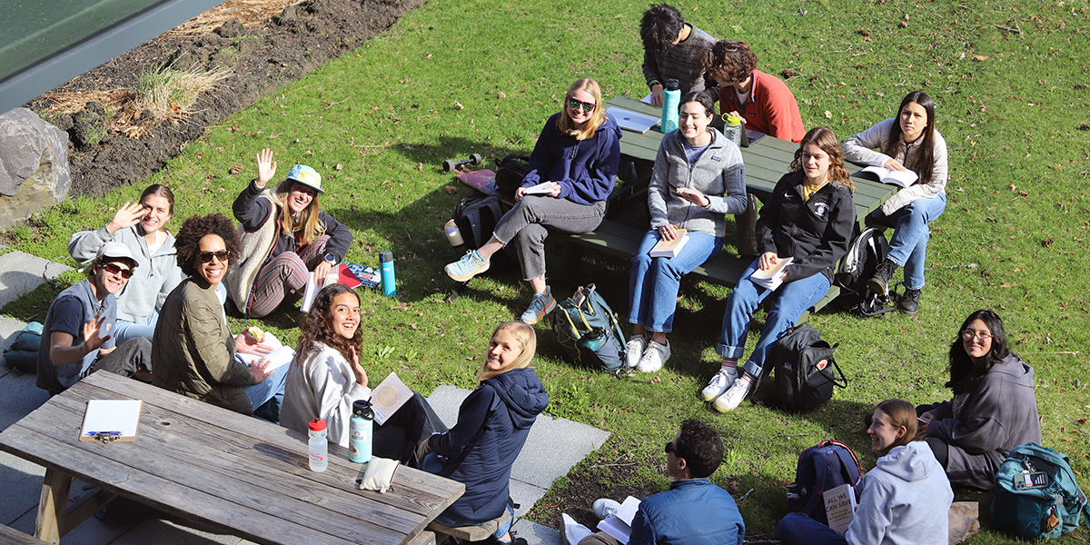 A class meets outside of Bowdoin's Roux Center for the Environment.