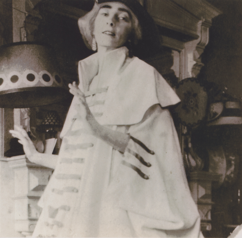 woman in a white costume with stripes