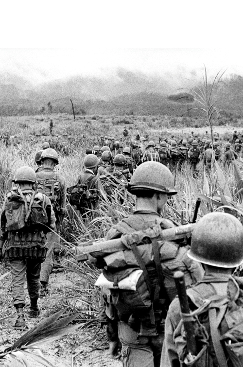 American soldiers marching in Vietnam, 1968