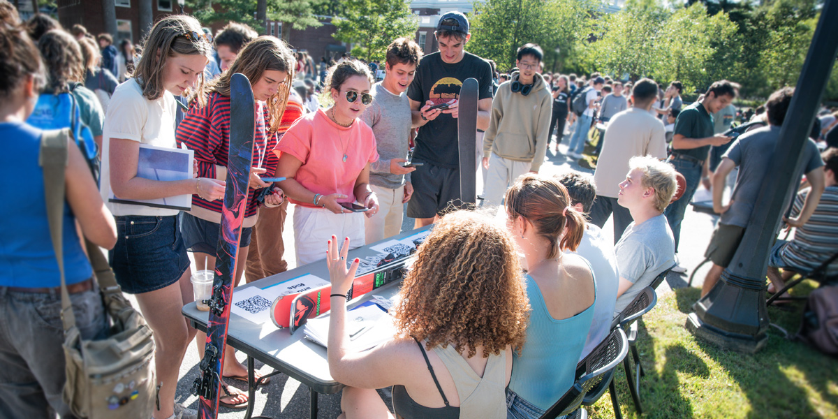 The Bowdoin club ski team talks to potential new members.