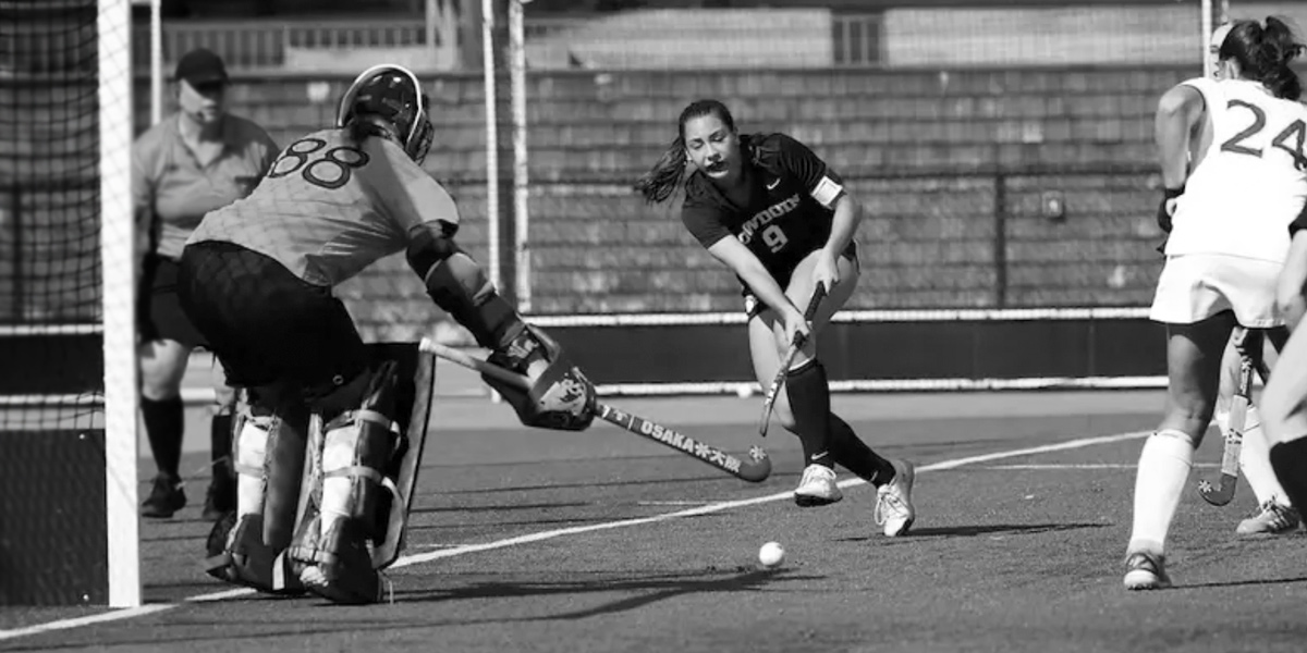 Bowdoin field hockey celebrates an overtime win over Williams.