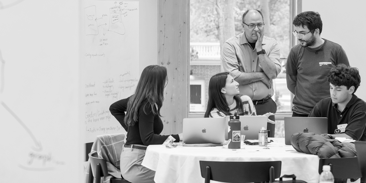 Students from Bowdoin, Bates, and Colby participate in the first generative AI hackathon.
