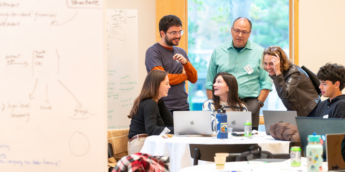 Students from Bowdoin, Bates, and Colby participate in the first generative AI hackathon.