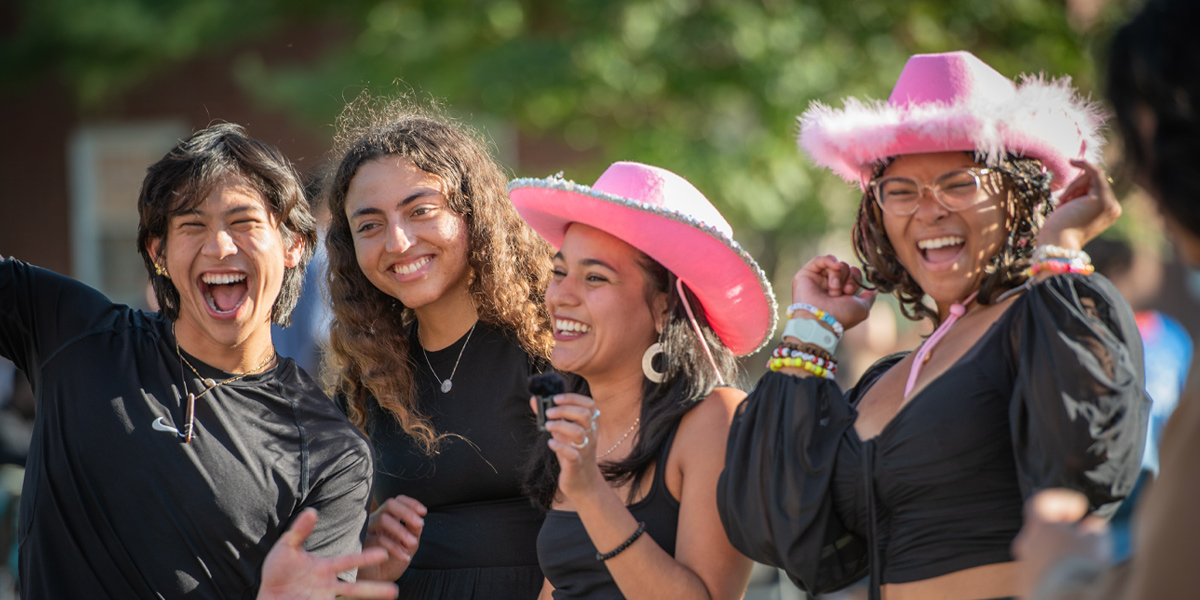 Bowdoin students recruit new members at the student activities fair.