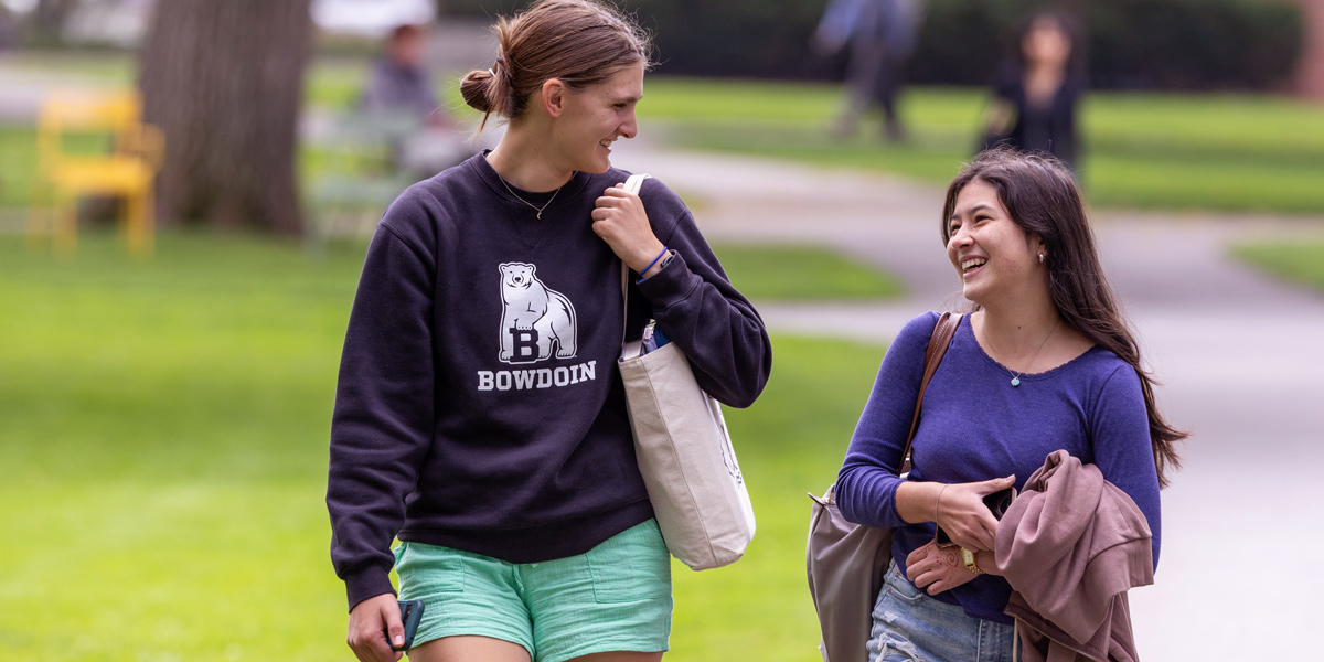 Bowdoin students enjoying the fall weather on the Quad.