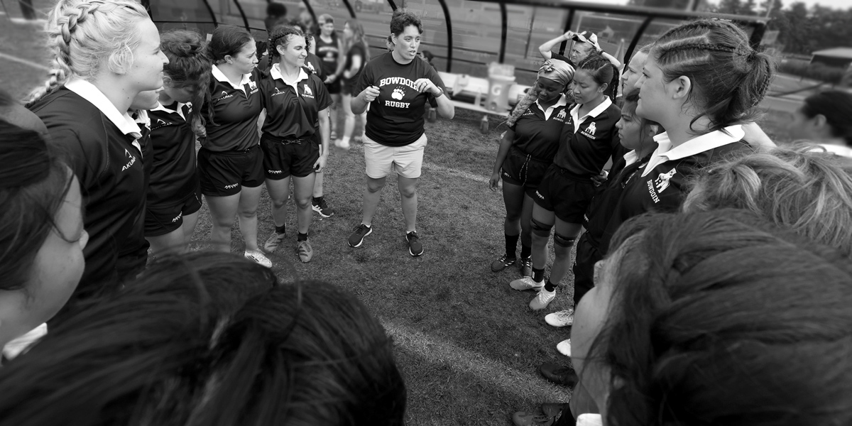 Bowdoin women's rugby gets hyped before a home game.