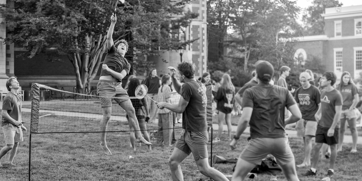New Bowdoin students plays badminton at the welcome back cookout.