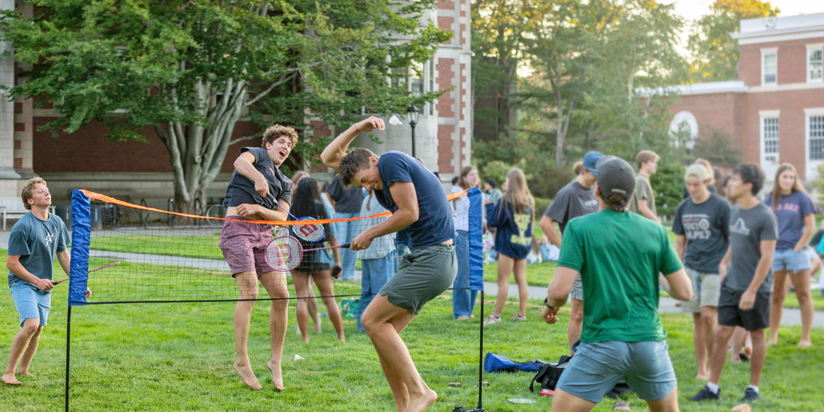 New Bowdoin students plays badminton at the welcome back cookout.