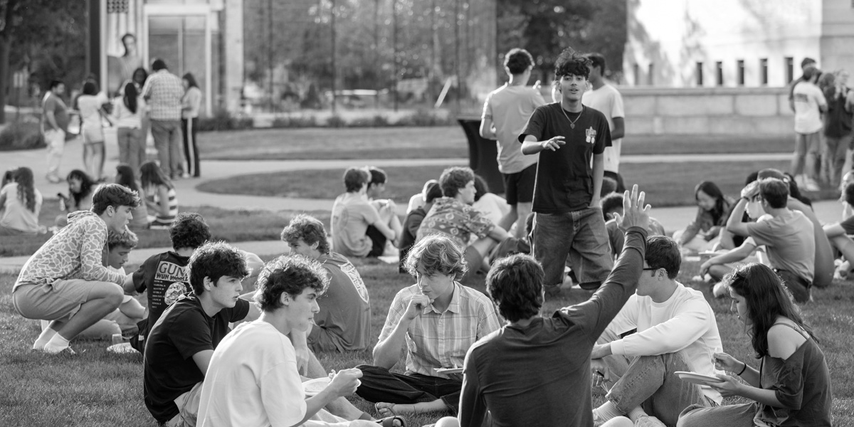 New Bowdoin students relax on the Quad.