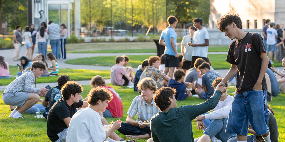 New Bowdoin students relax on the Quad.