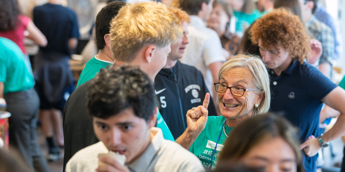 Bowdoin first-year students meet with faculty during the languages open house.