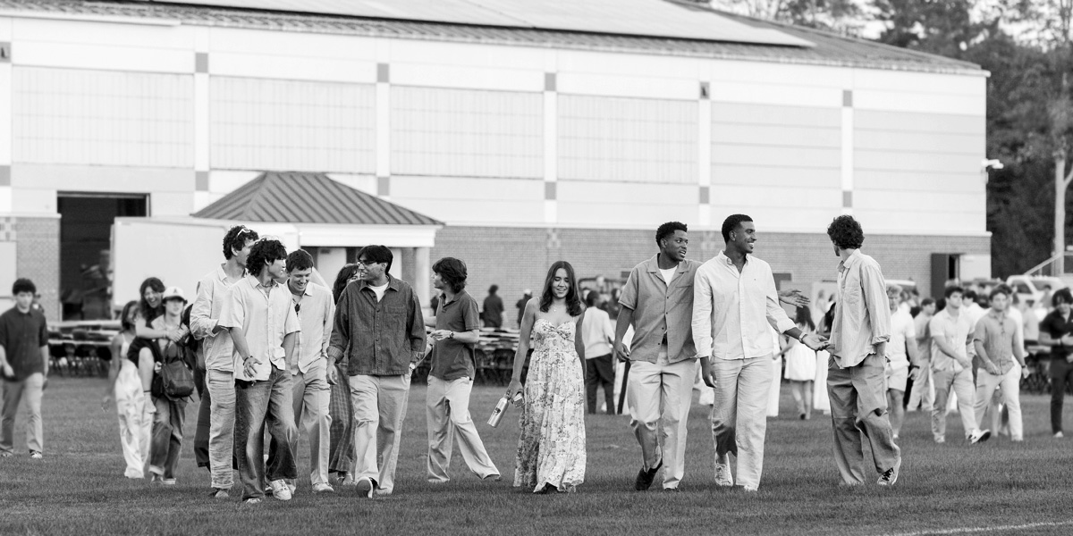 Bowdoin students gather to celebrate beautiful fall weather.