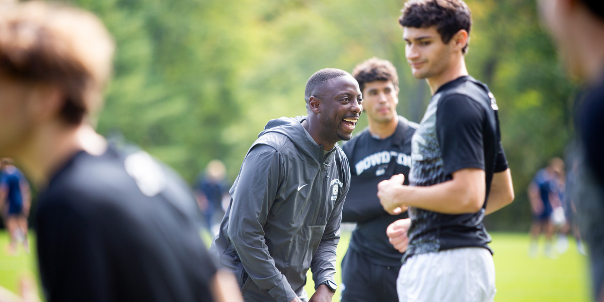 Bowdoin men's soccer rallies the team at home.