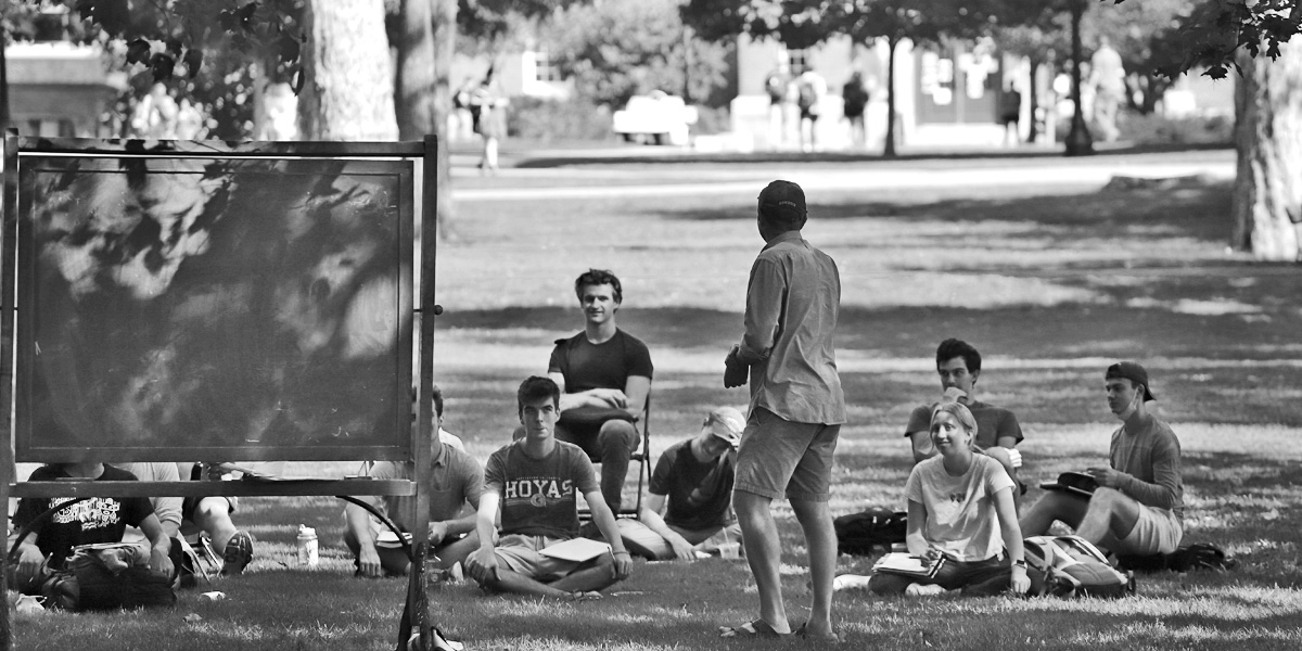 An "Introduction to Analysis" class meets on the Bowdoin Quad.