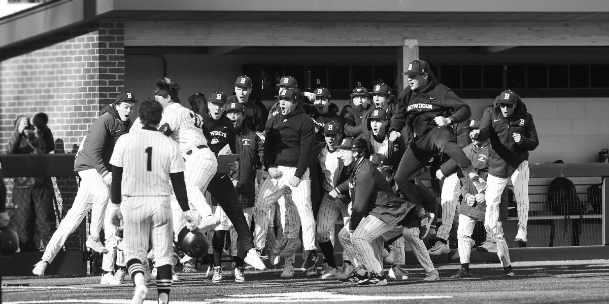 Bowdoin baseball celebrates at home plate.