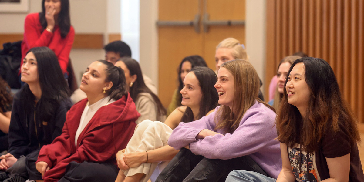 Bowdoin students cheering for one another.