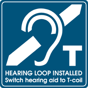 Standard sign indicating there is a hearing loop installed and stating to switch hearing aid to the tcoil setting. 