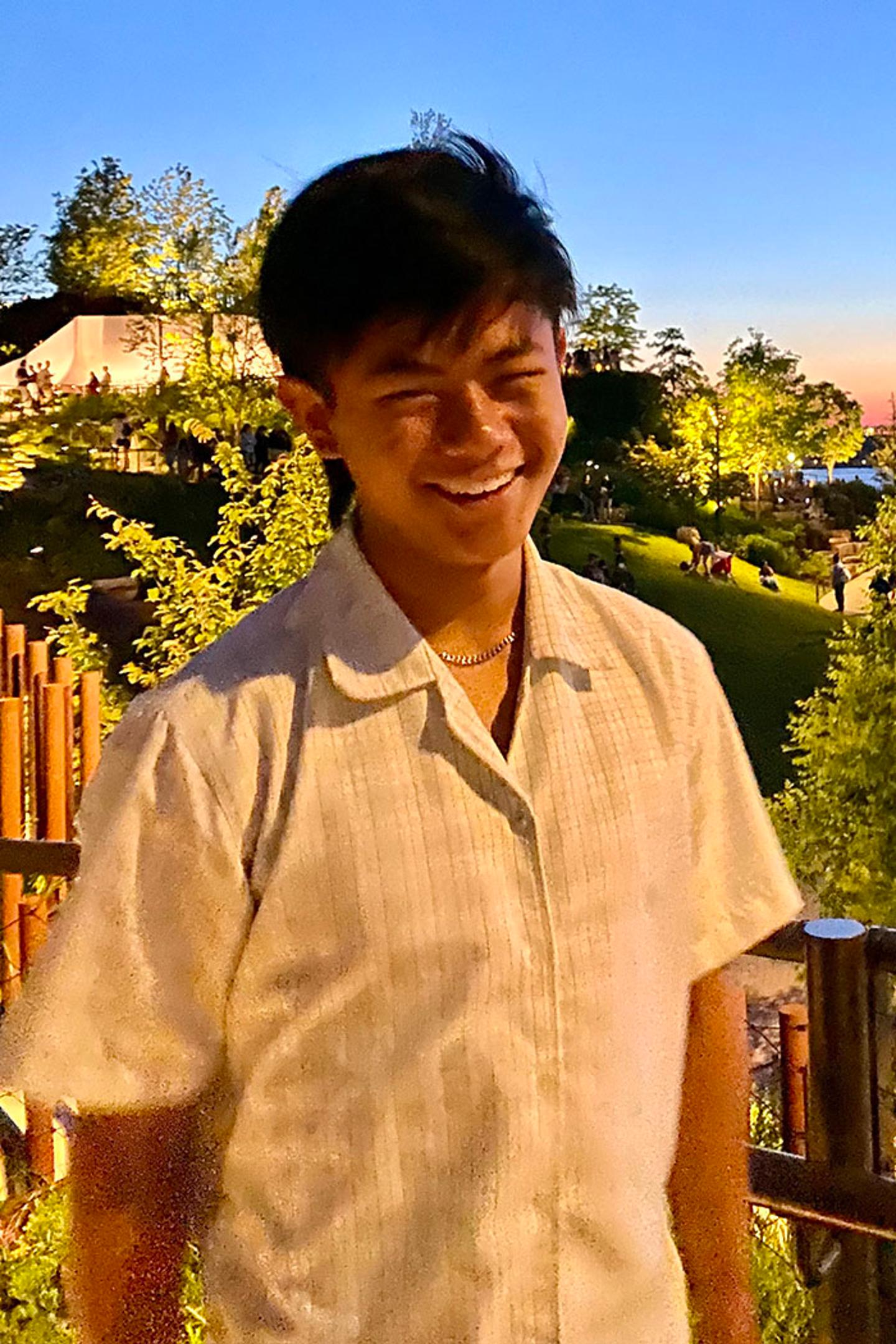 a headshot of Aden Ho