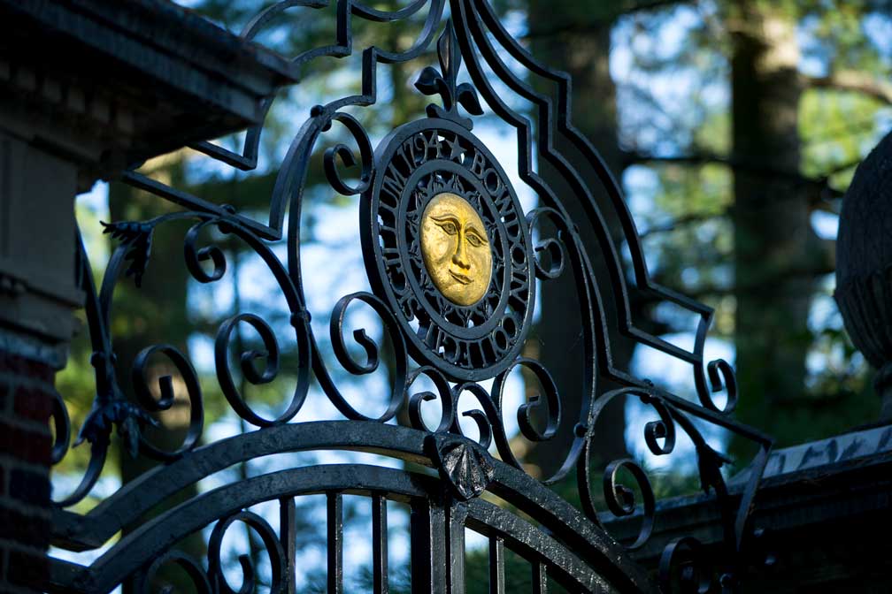 Bowdoin sun on wrought iron gate