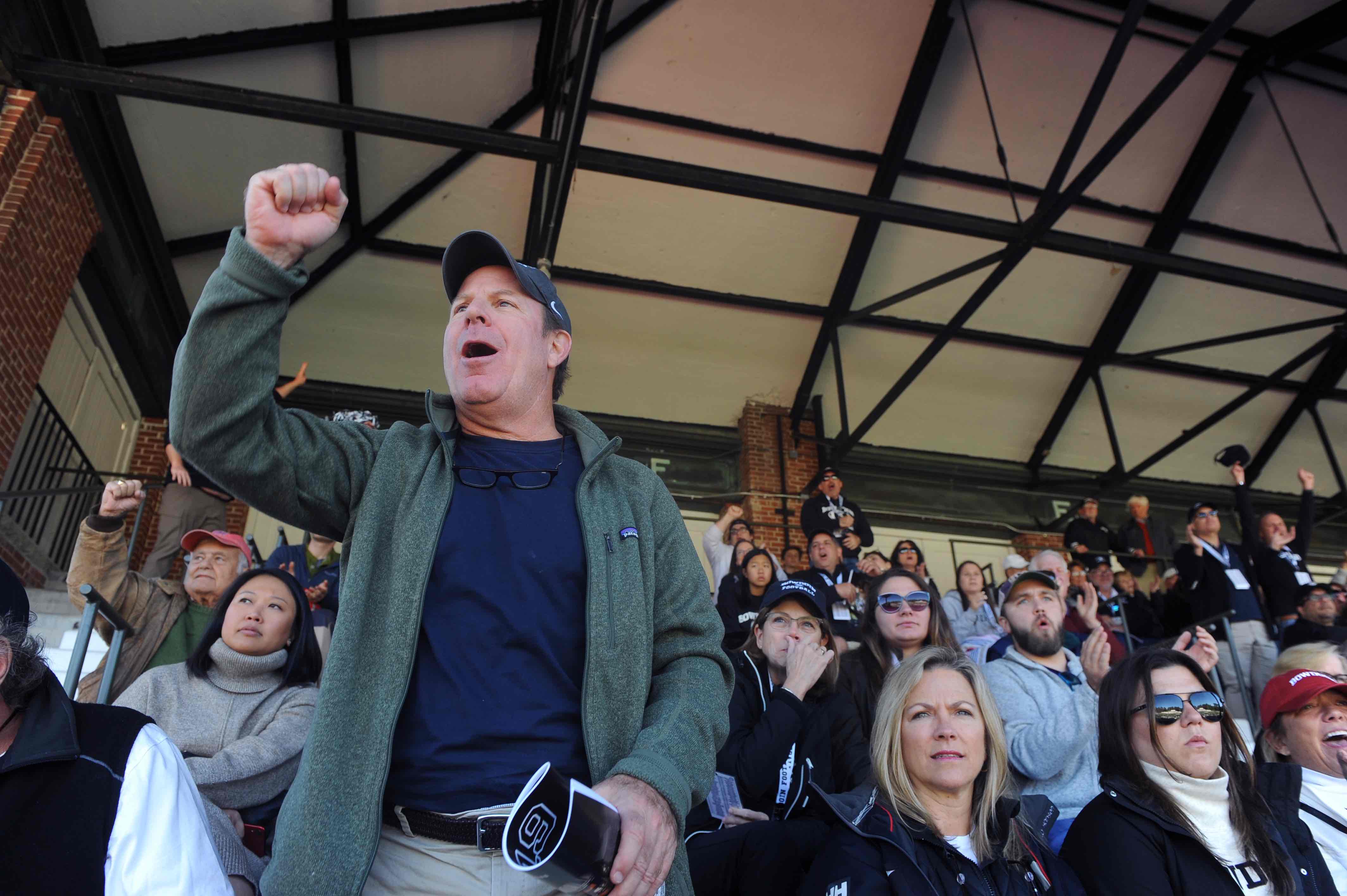 Fans cheering at Homecoming