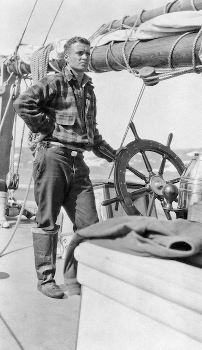 Jack Crowell standing on a boat