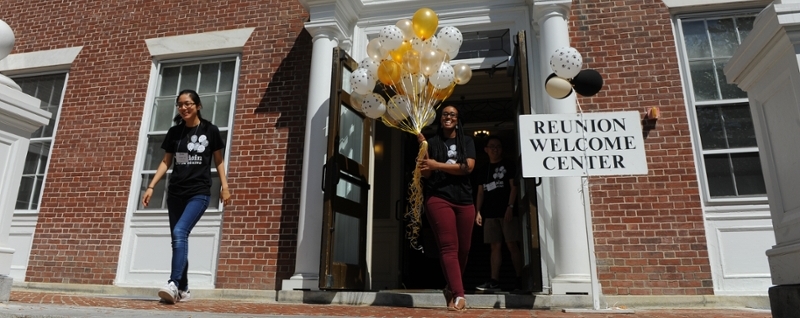 Volunteers with balloons at Reunion