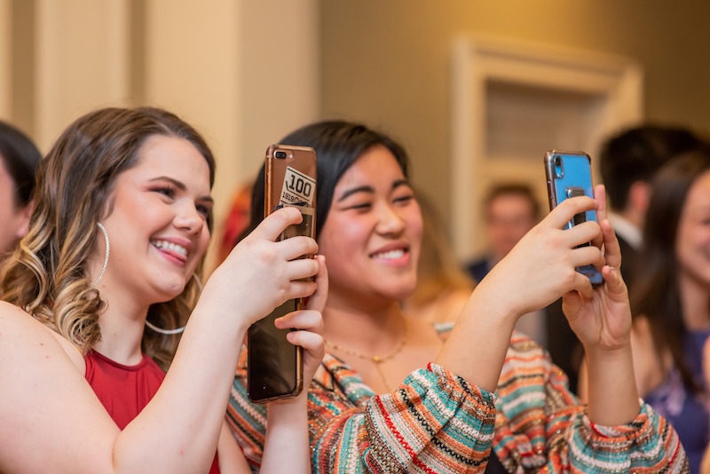 alumni taking selfie