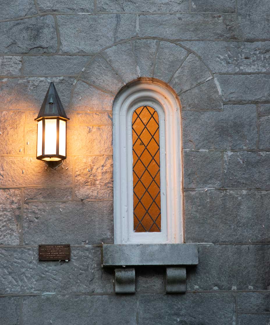 Window on gray stone building