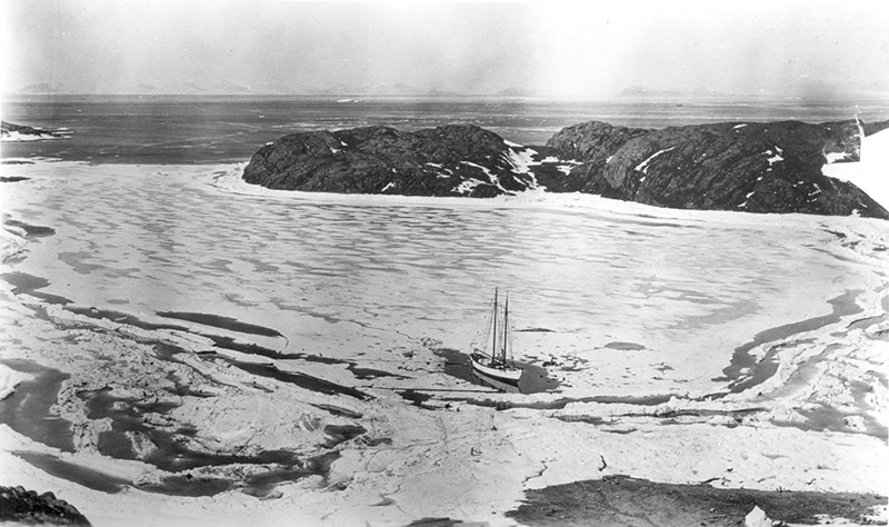<p><b>The <em>Bowdoin</em> after a long winter</b> </p>    Donald B. MacMillan envisioned the <em>Bowdoin</em> as a movable platform for Arctic research. The schooner spent many months purposefully frozen in the ice of sheltered harbors while MacMillan and his crews conducted research. When the ice finally melted, sometimes as late as August, it would be time to return south and begin preparations for the next expedition.   <br /> <br />  Donald B. MacMillan, Refuge Harbor, Northwest Greenland, 1924. Gift of Dr. Edward K. Morse.