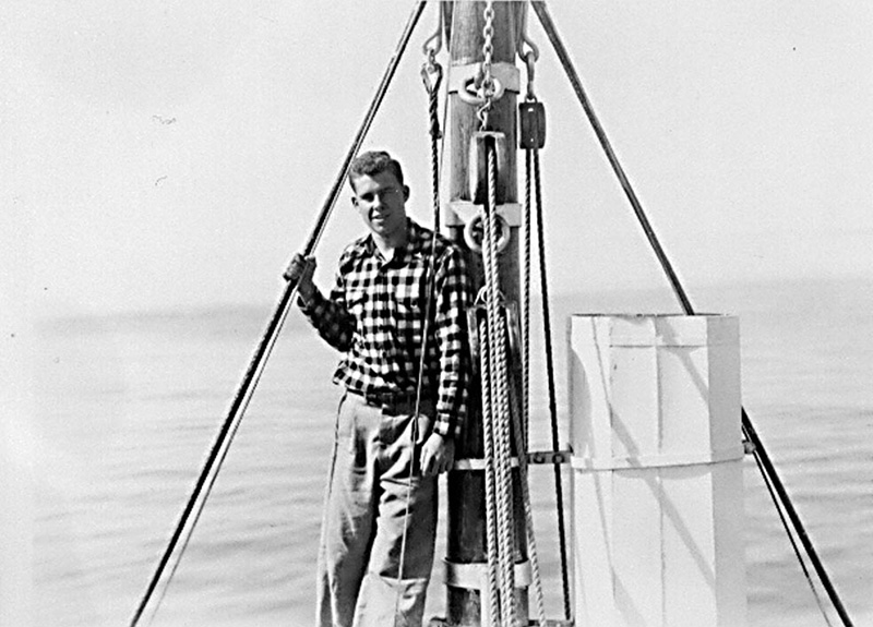 <p><b>Daily Life</b> </p>   Young crew members learned all aspects of sailing a vessel aboard the <em>Bowdoin.</em> The crew was divided into two watches, so that one half of them were on duty at all times while under way. Climbing the mast to the ice bucket, navigating the ship through fields of pack ice and helping the cook in the galley were all a regular part of their duties.   <br /> <br />  Donald B. MacMillan. Andy Pruitt at the ice bucket, 1949. Silver gelatin print. Gift of Miriam Look MacMillan.