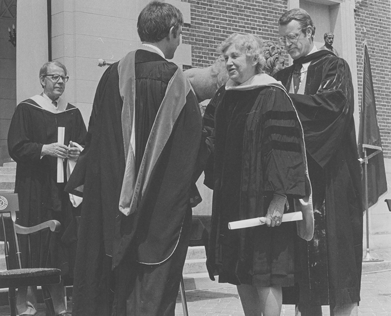 Miriam MacMillan receiving her honorary degree from President Enteman, Brunswick, 1980