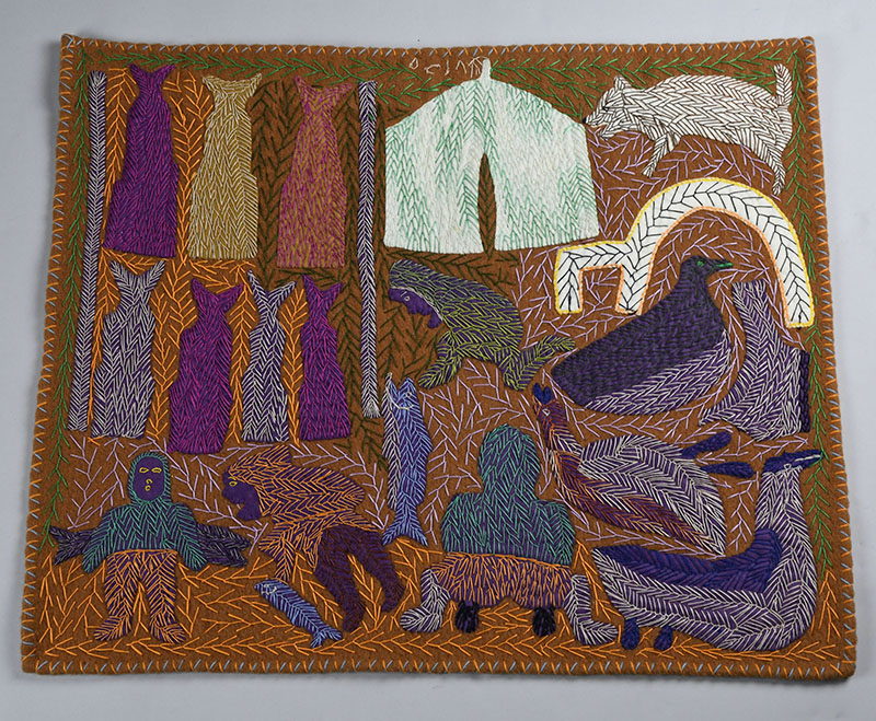 fabric and embroidery thread to illustrate activities at a spring fish camp