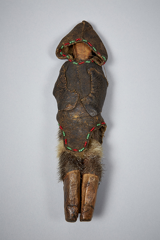 Inuit doll in skin parka.