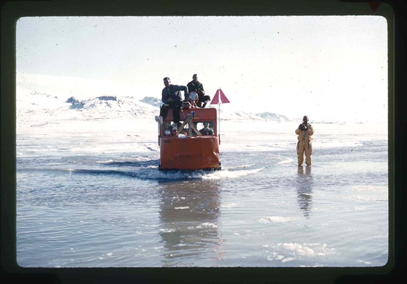 Photo by Don MacMillan of boat in ice