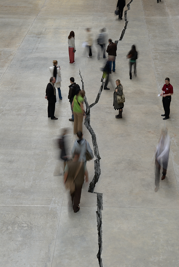 installation art at the Tate Museum depicting Doris Salcedo's Shibboleth, a large earthquake-like split in the floor of Turbine Hall