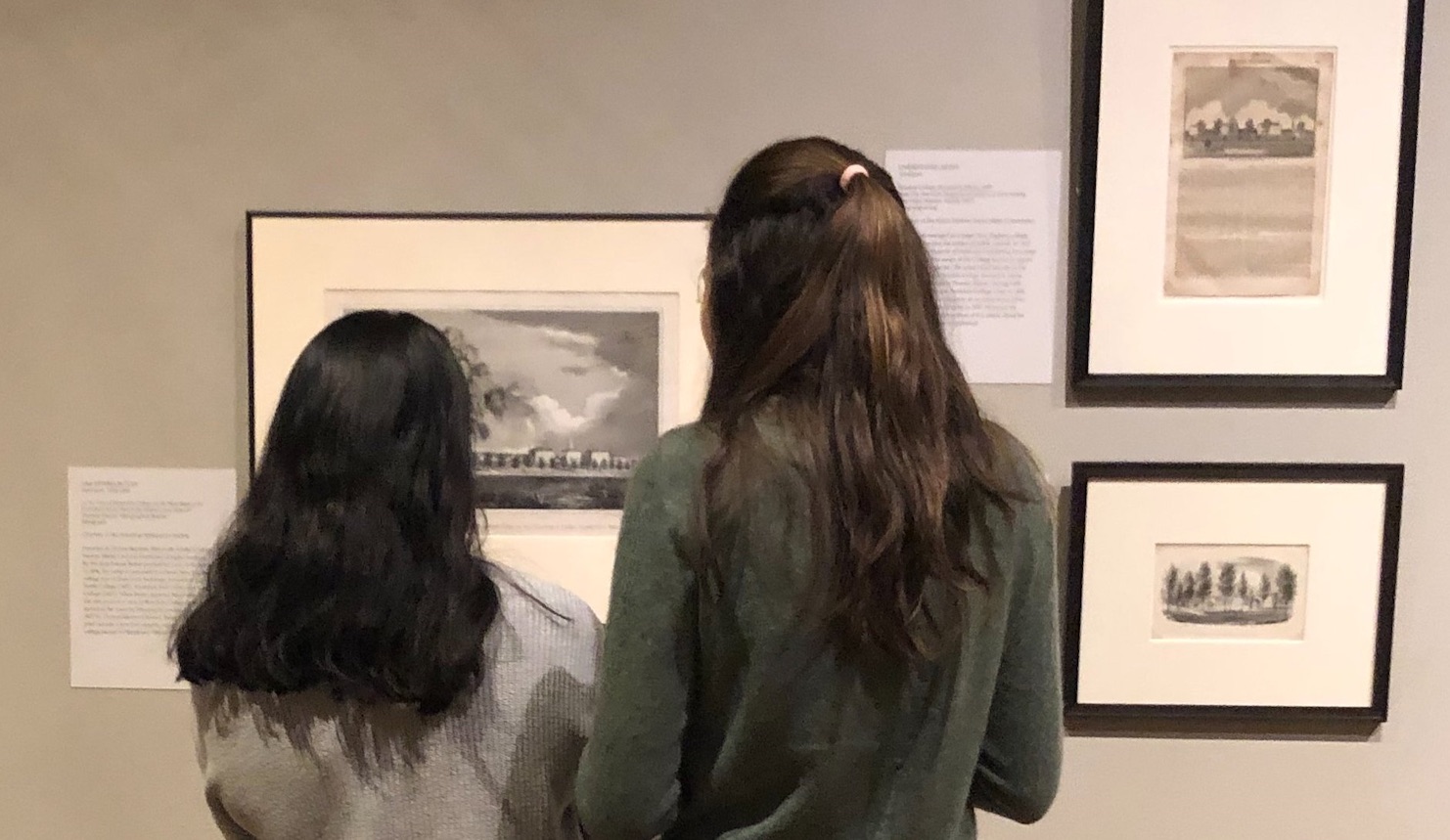 Two students viewing art in the Bowdoin College Museum of Art