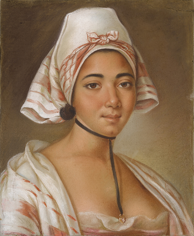 A head and shoulders portrait of a woman