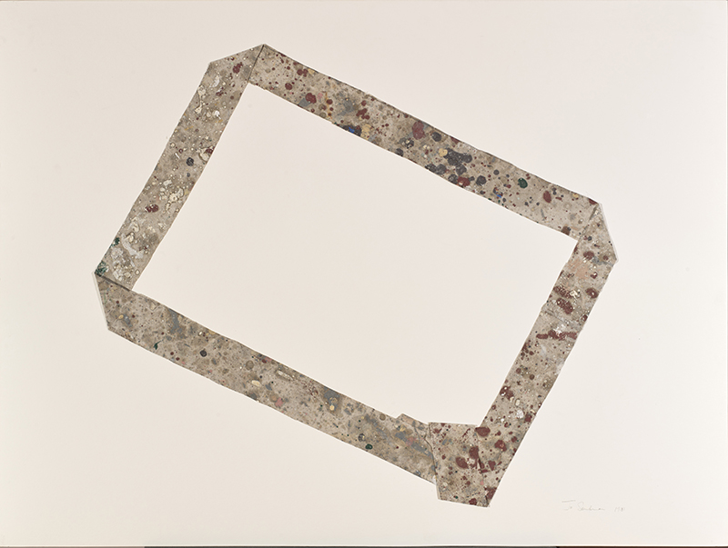 An off-center rectangle made of cloth with paint splatters