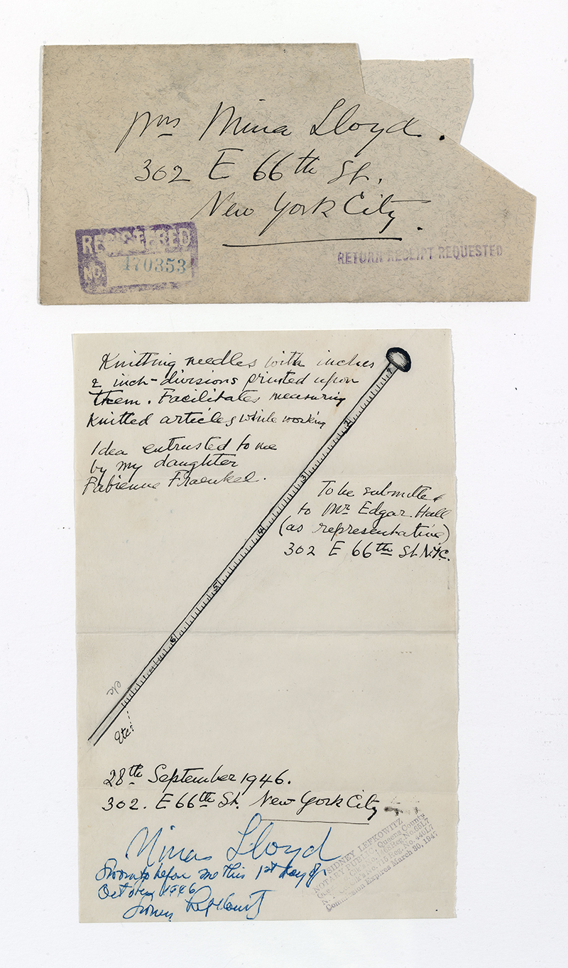 an envelope and a letter showing a knitting needle with measurement markers