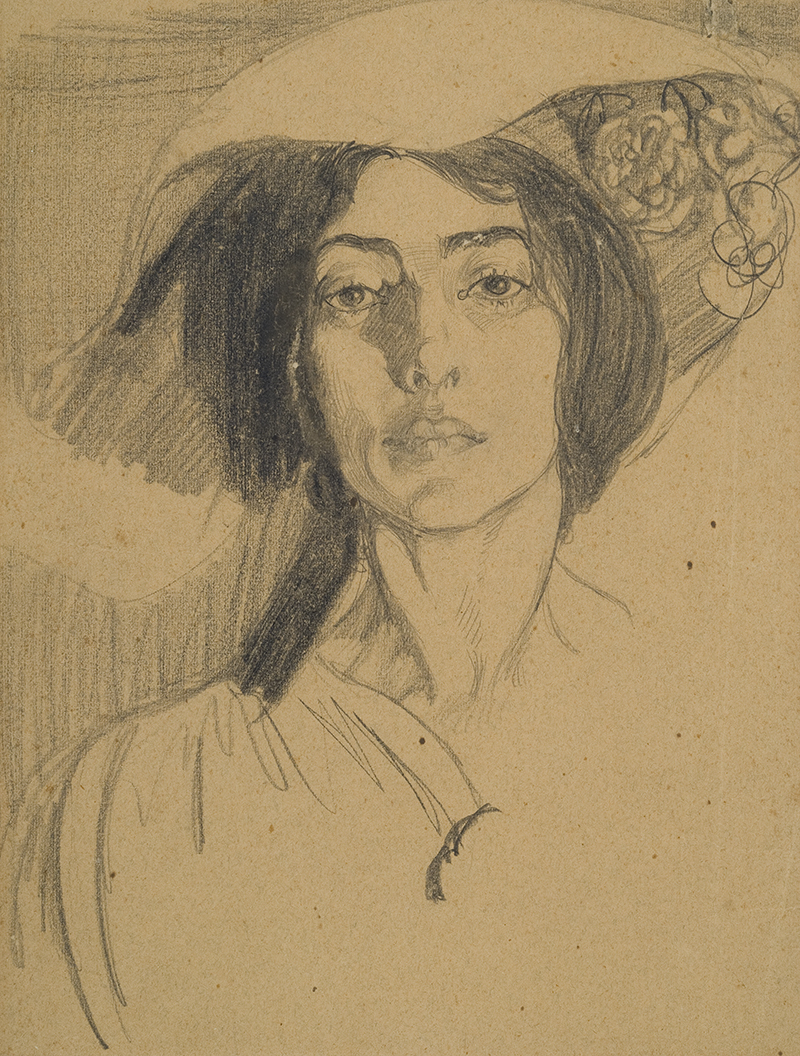 A drawing in graphite on brown paper of the face of a woman with dark hair in a hat with a wide brim