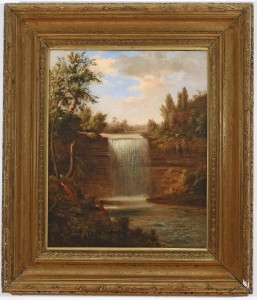 nature scene of a river with waterfall, trees in foreground, blue sky in back