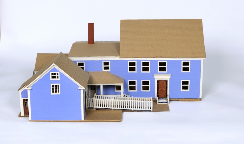 A scale model of a periwinkle blue building