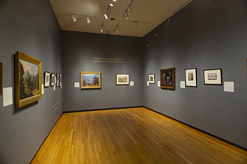 a gallery with paintings on the walls