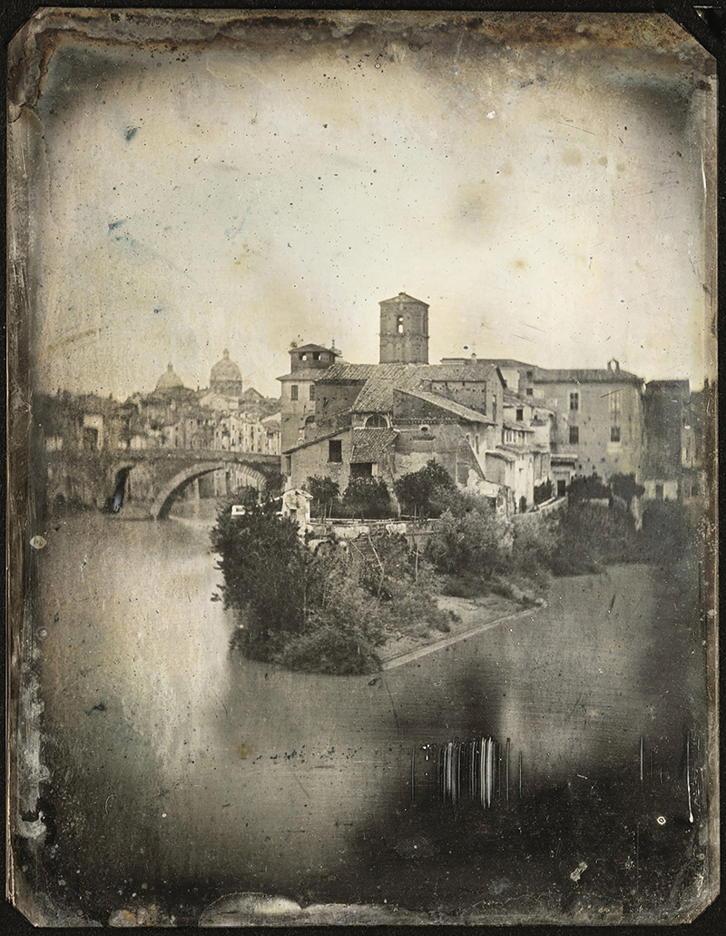 An old photograph showing a church in Rome on an island