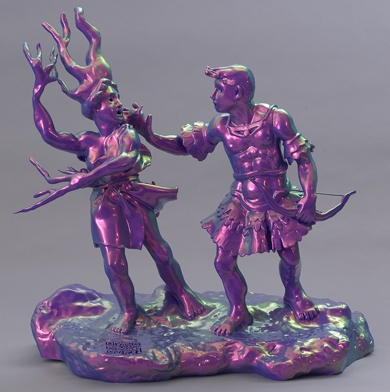 A sculpture showing a woman turning into a tree, and a man in armor