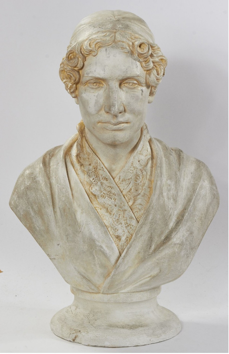 a marble bust of a woman in 19th-century dress and hairstyle