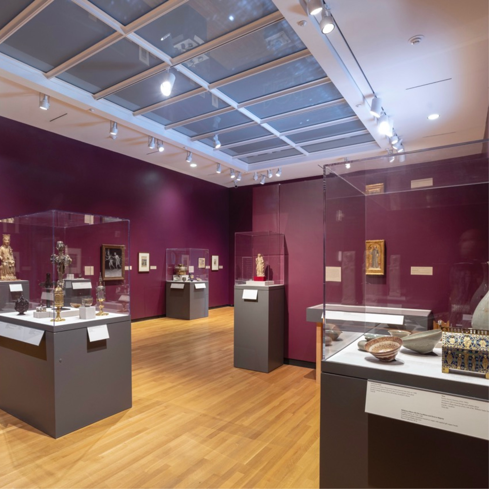 Medieval objects are displayed in an art museum gallery