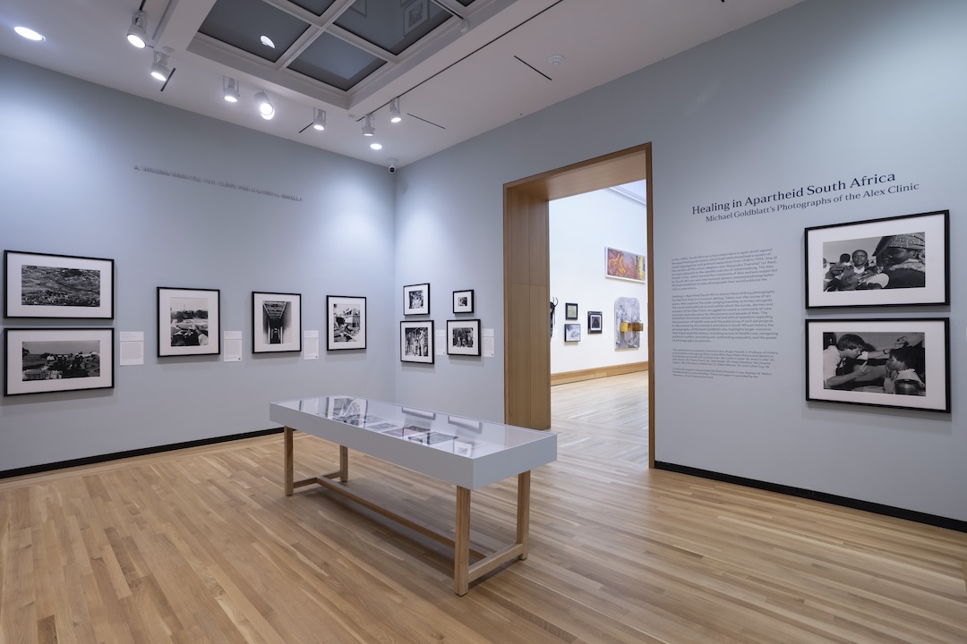 A museum exhibition displays black and white photography 