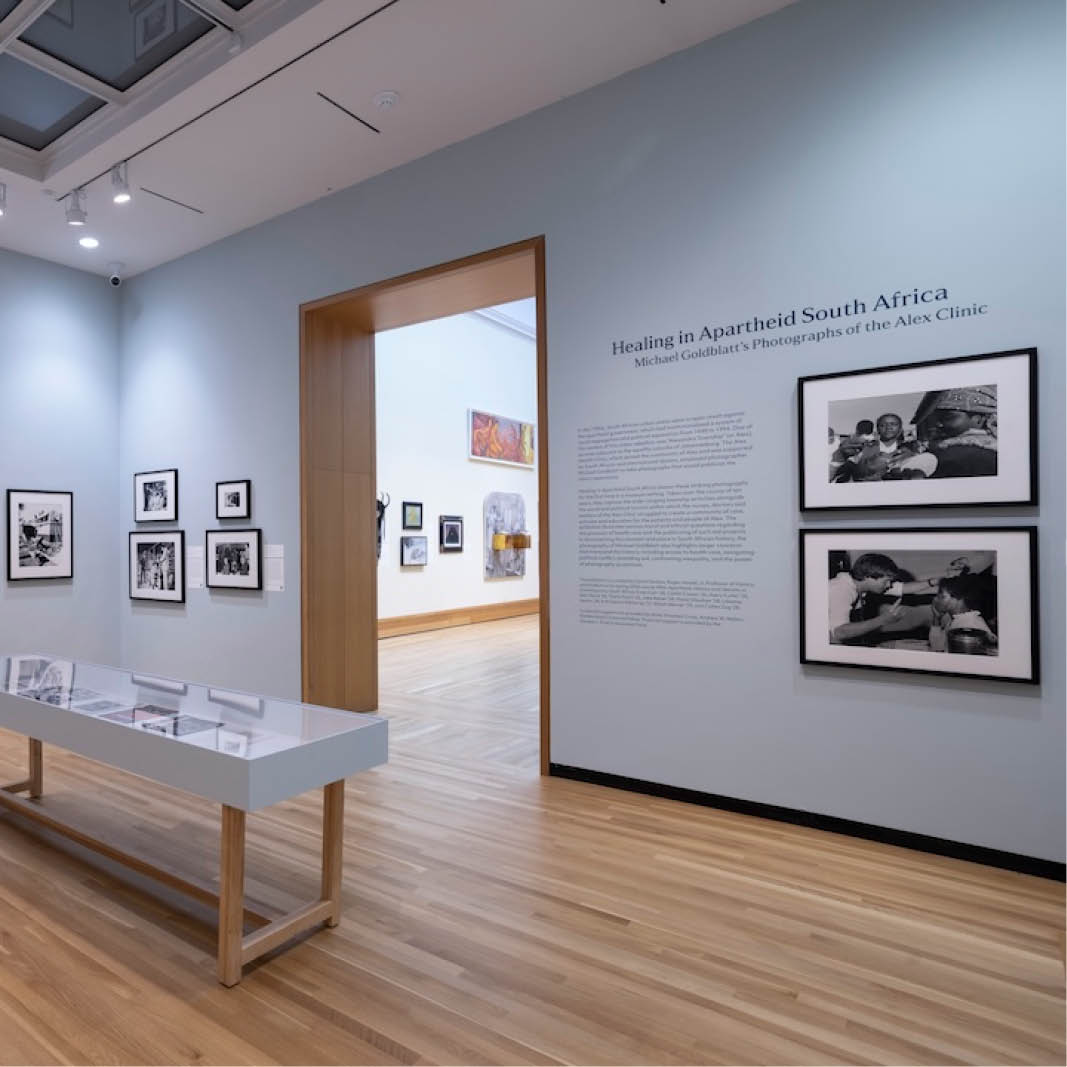 A museum exhibition displays black and white photography